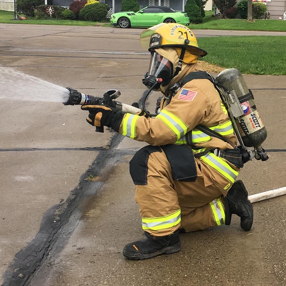 firefighter with hose