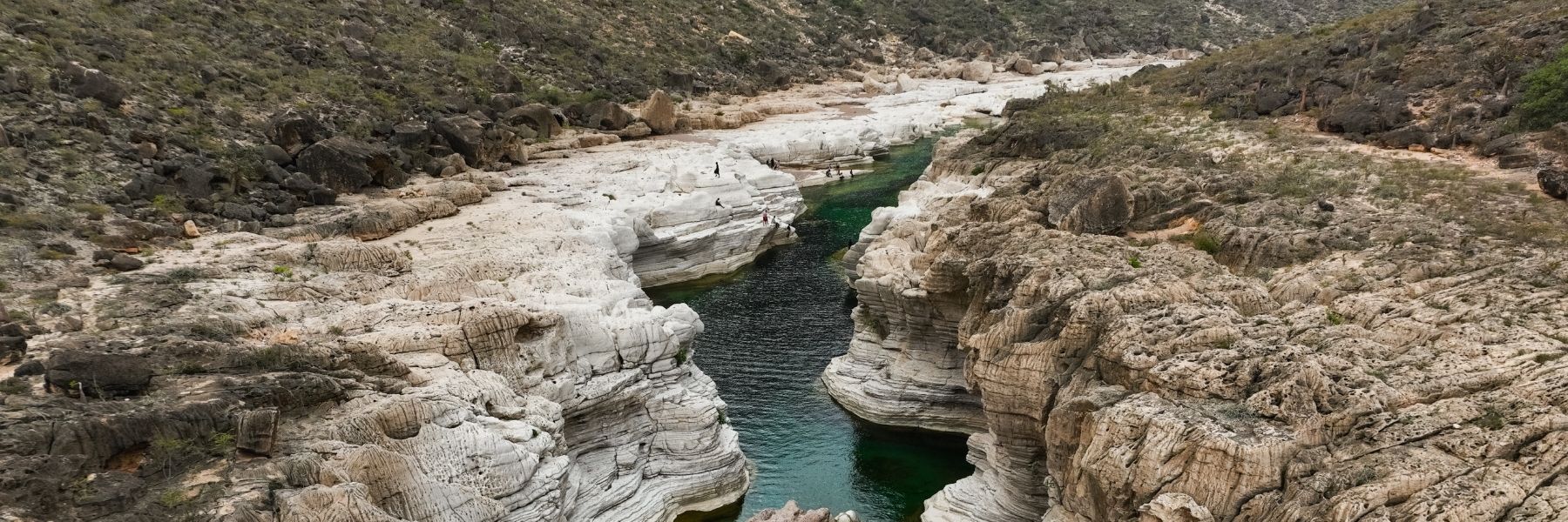 A river cuts through a rock formation.